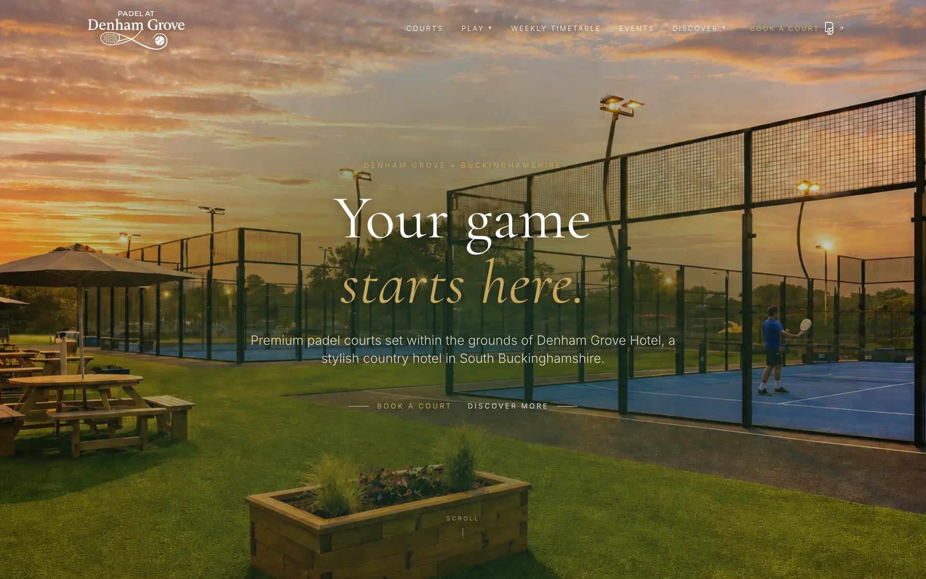 The live landing page: a golden-hour photograph of the floodlit panoramic courts in the hotel grounds, with the serif headline set over the lawn and the booking call to action in view.