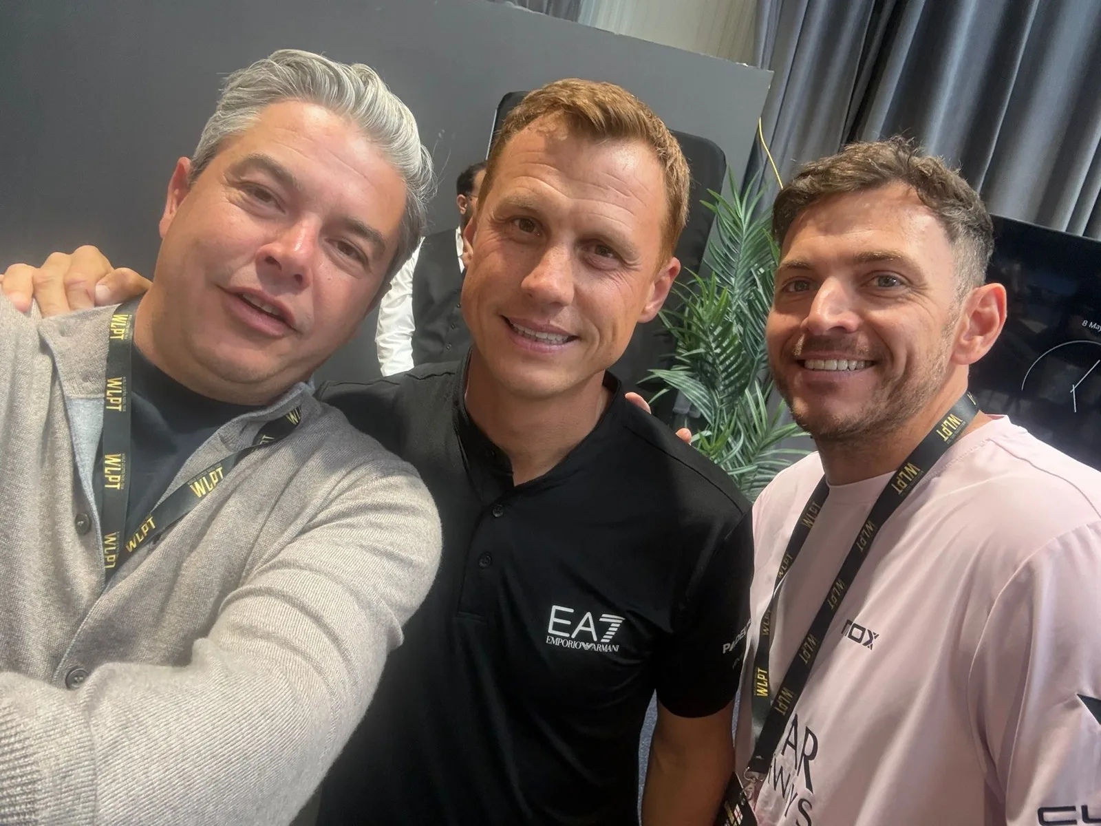 Steve Sidwell in his black EA7 polo with two of the PadX and Genius Digital Labs team in the performance lounge.